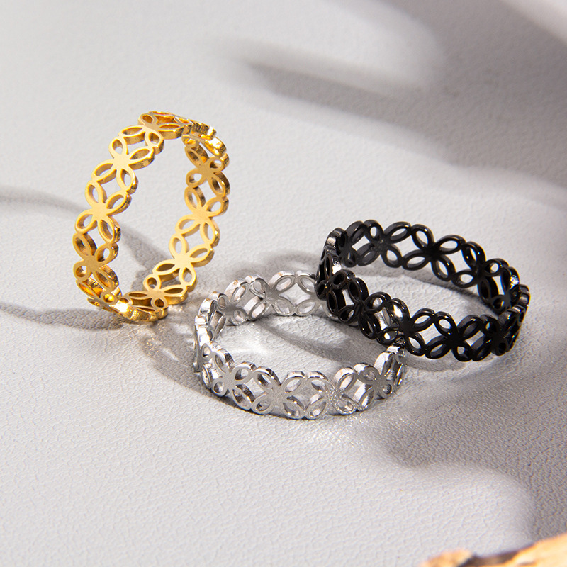Laser-cut four-leaf flower hollowed-out titanium steel women's rings and couple rings in the style of Instagram in Japan and South Korea