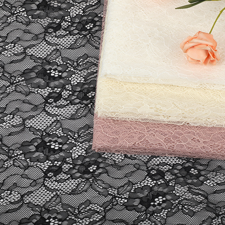 现货粉色锦氨蕾丝面料精致小花朵经编蕾丝面料礼服连衣裙面料