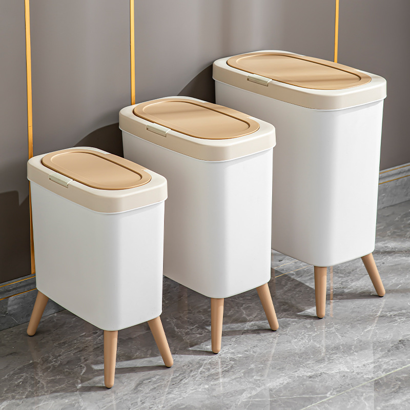 A new type of high-legged trash can for home use, featuring a light luxury and high-end design for the living room, bathroom and kitchen, with a no-bending press-type paper basket Application Scenario