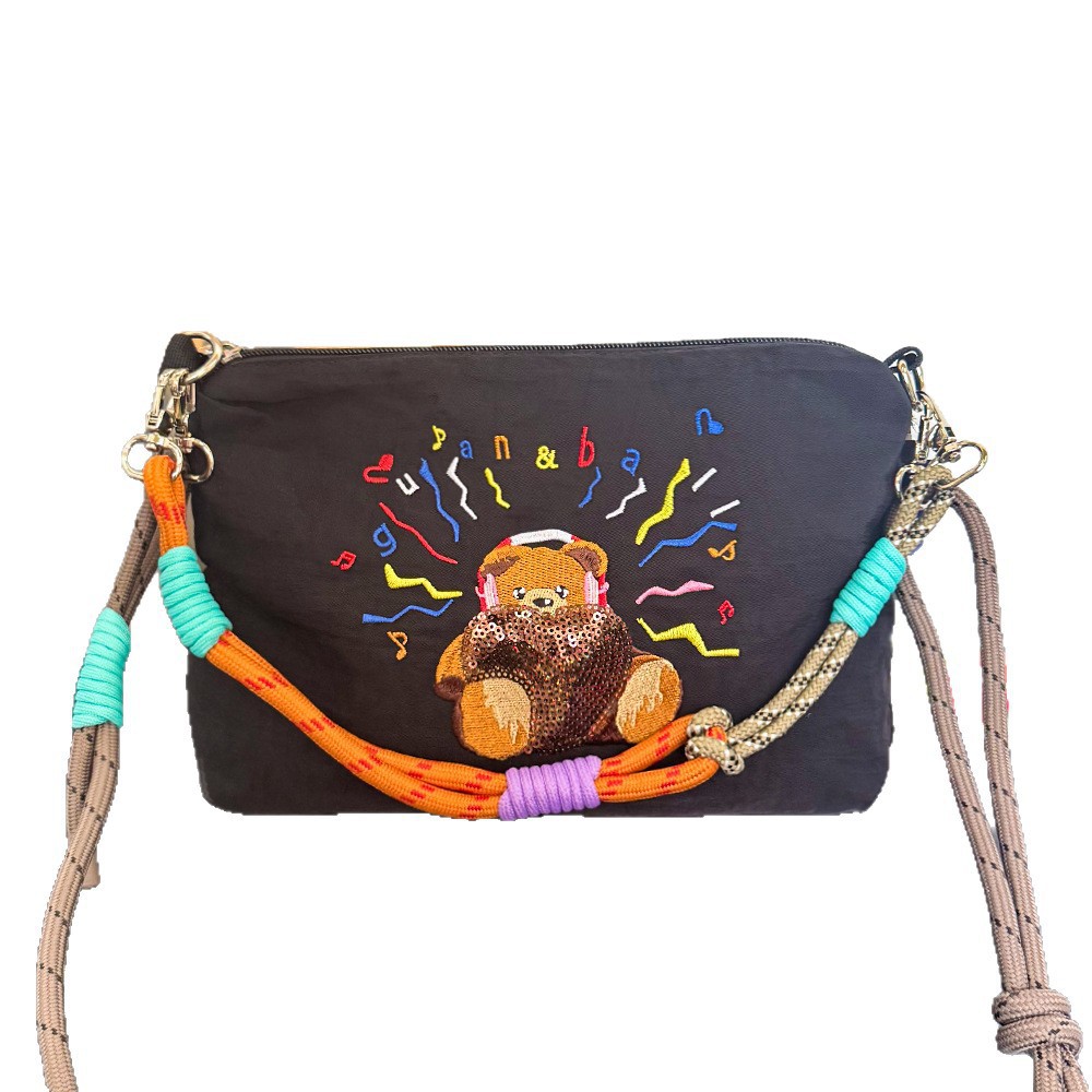 夏季新款日系刺绣防水单肩包小众设计百搭通勤大容量休闲斜挎包女白底实物图