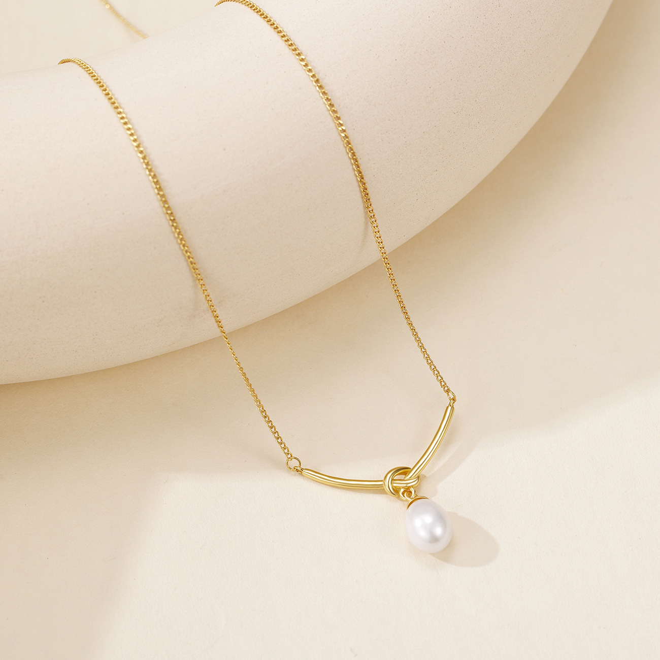Silver knot freshwater pearl necklace, women's teardrop Korean version, simple and niche design silver jewelry wholesale details Picture