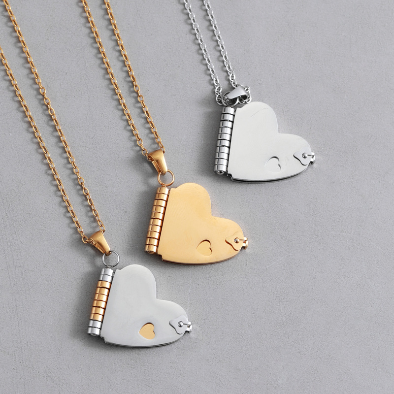 A popular titanium steel heart-shaped book necklace for women in Europe and America, a light luxury and niche stainless steel couple necklace that can be opened and engraved details Picture