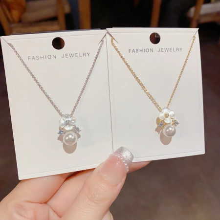Wholesale of niche, stylish and fresh shell flower pearl pendant necklace, personalized, light luxury and versatile collarbone chain Wholesale of niche, stylish and fresh shell flower pearl pendant necklace, personalized, light luxury and versatile collarbone chain