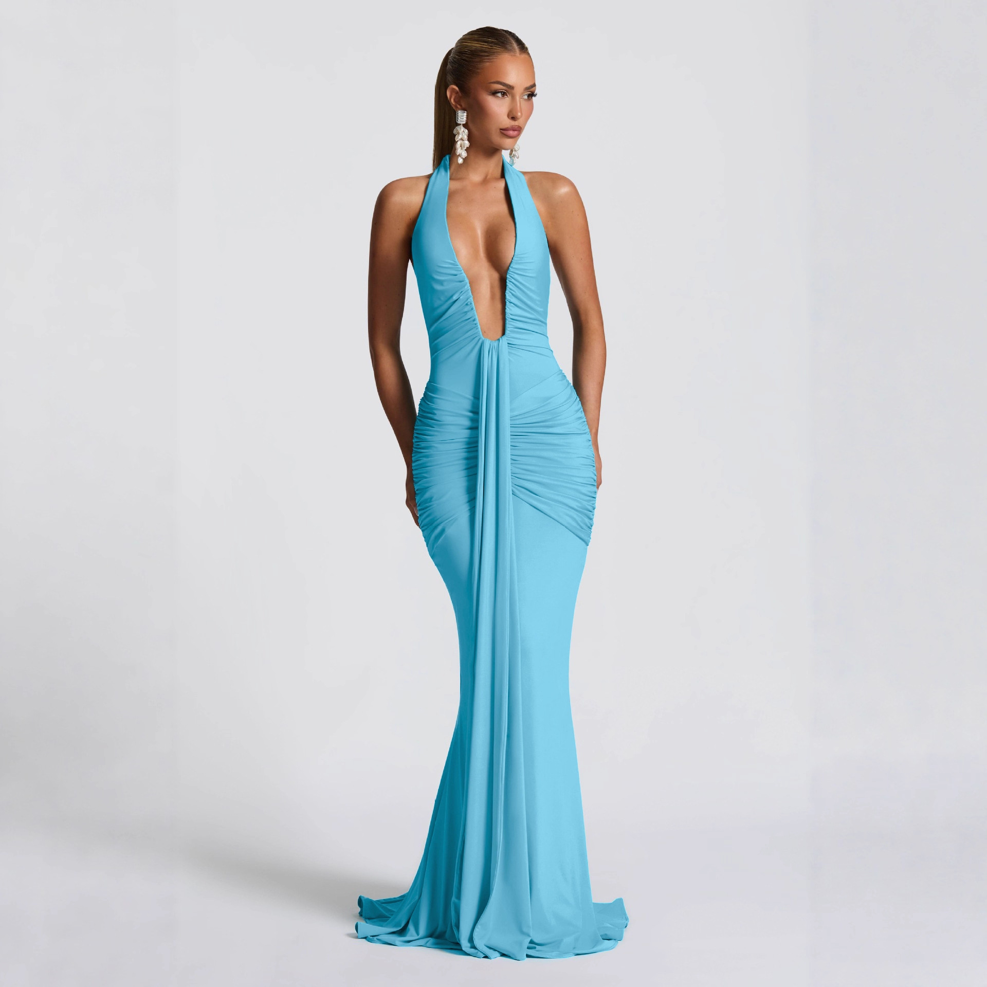 This is a popular summer women's dress with a European and American style. It features a cross-border sexy and elegant deep V-neck, backless, and form-fitting pleated dress Specification drawing