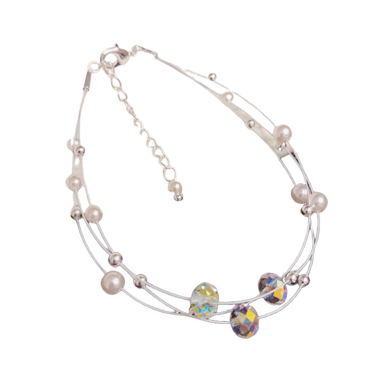 Amazon cross border fashion simple cristal perla de tres capas de línea de pesca pulsera temperamento ligero lujo diseño versátil sentido de la mano decoración Item Picture