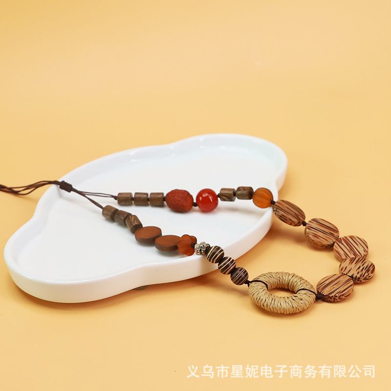 Xingni Original long coconut wood straw woven circle, long glass and solid wood sweater chain, retro ethnic style accessories cross-border details Picture