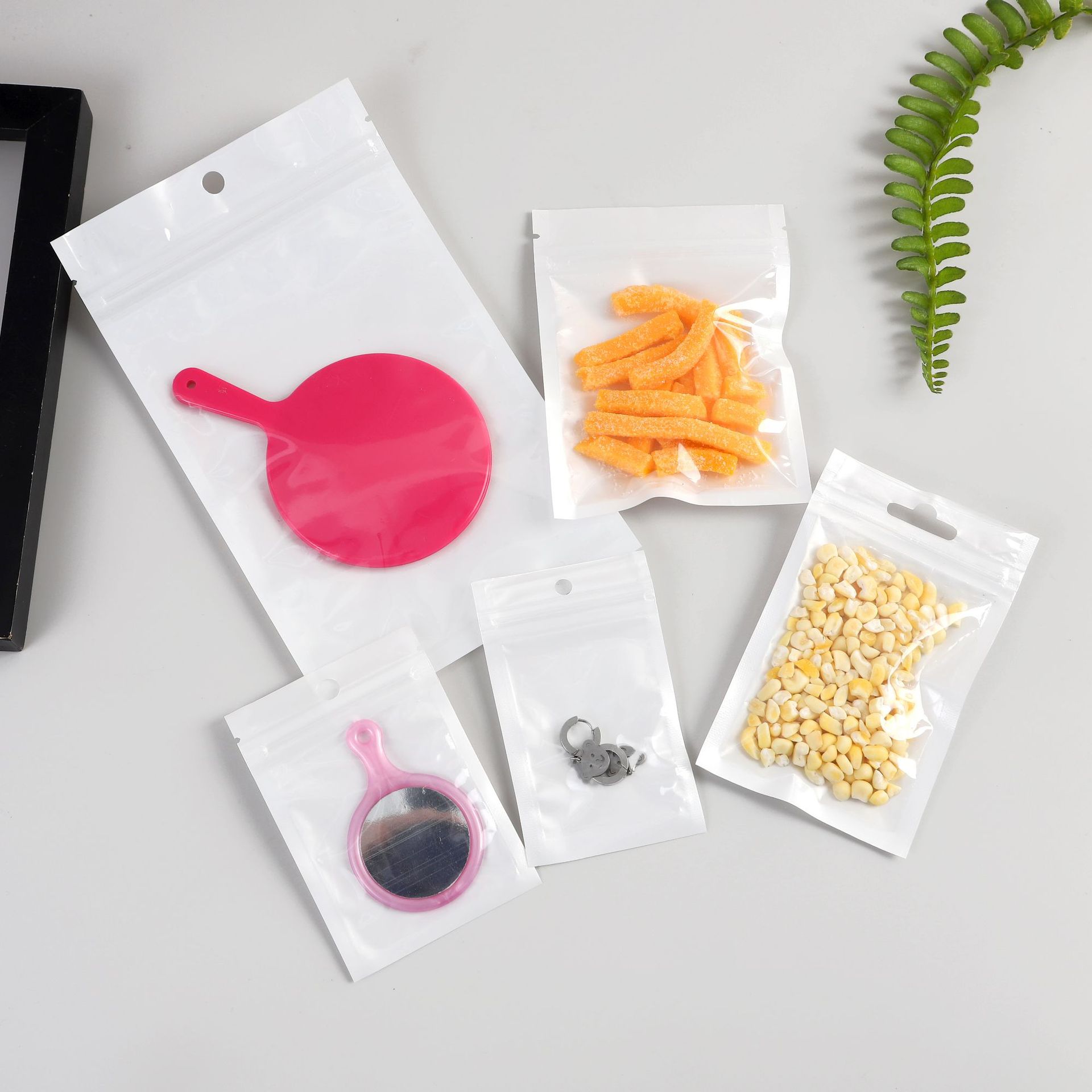 Jewelry packaging bags, pearlescent film, yin-yang bone bags, semi-transparent phone cases, data cables, plastic self-sealing bags, small size wholesale details Picture