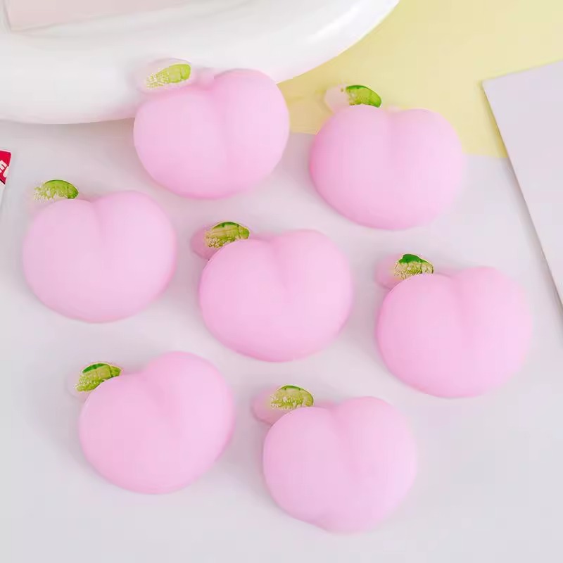 The best-selling super cute peach-shaped three-dimensional watermelon peach Pinching fun TPR soft rubber releases the adorable little bottom details Picture