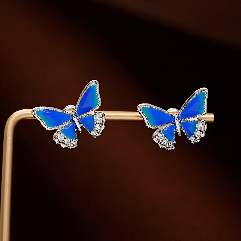 Hyacinth diseño original esmalte goteo esmalte azul mariposa pendientes ins pequeño temperamento dulce luz de lujo commuter earrings