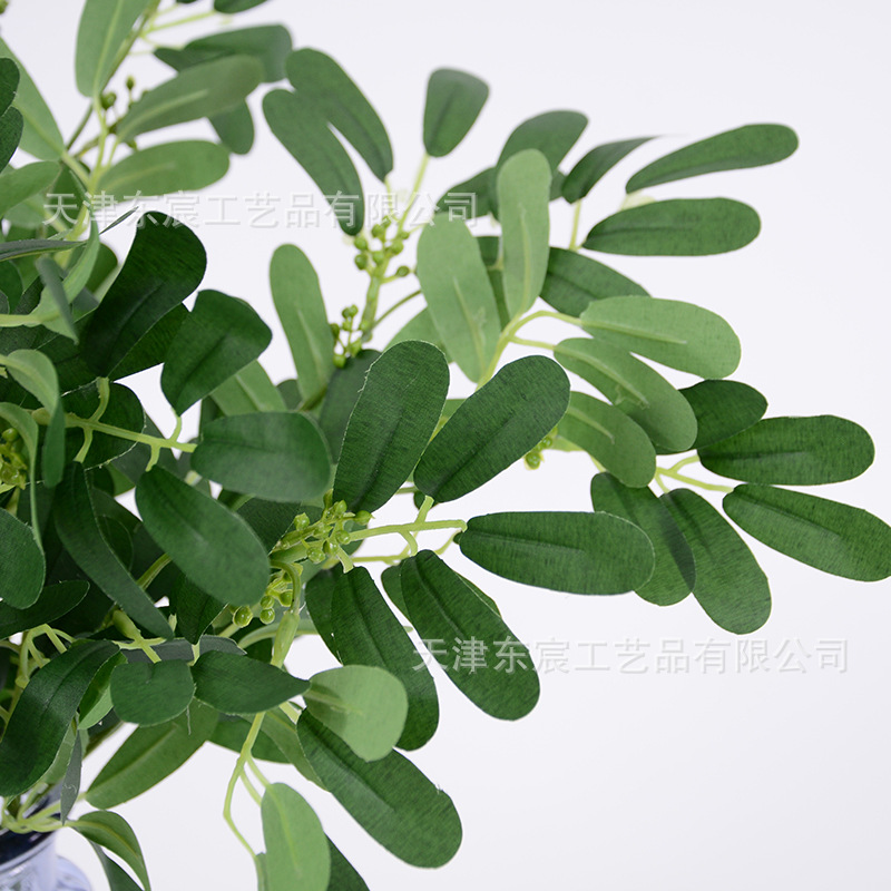 Artificial green plants and jujube leaves are bundled to create hotel landscape designs, wedding scene arrangements, flower boxes, and flower forest-themed flower wall flower arrangements details Picture