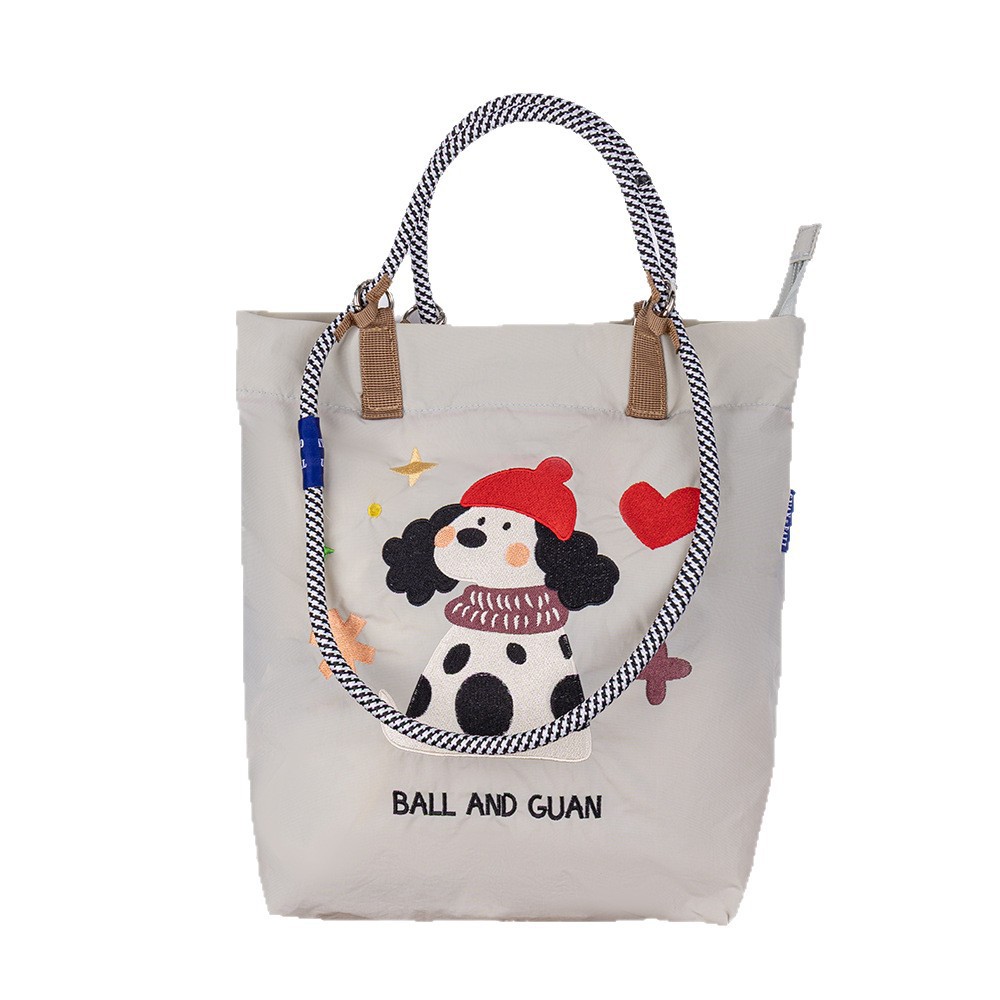 夏季新款卡通万针刺绣防水托特包小众百搭通勤早八大容量单肩包女白底实物图