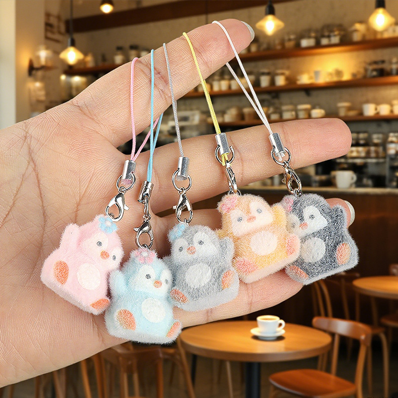 New cartoon and cute plush three-dimensional resin penguin key chain bag pendant, mobile phone lanyard gift wholesale
