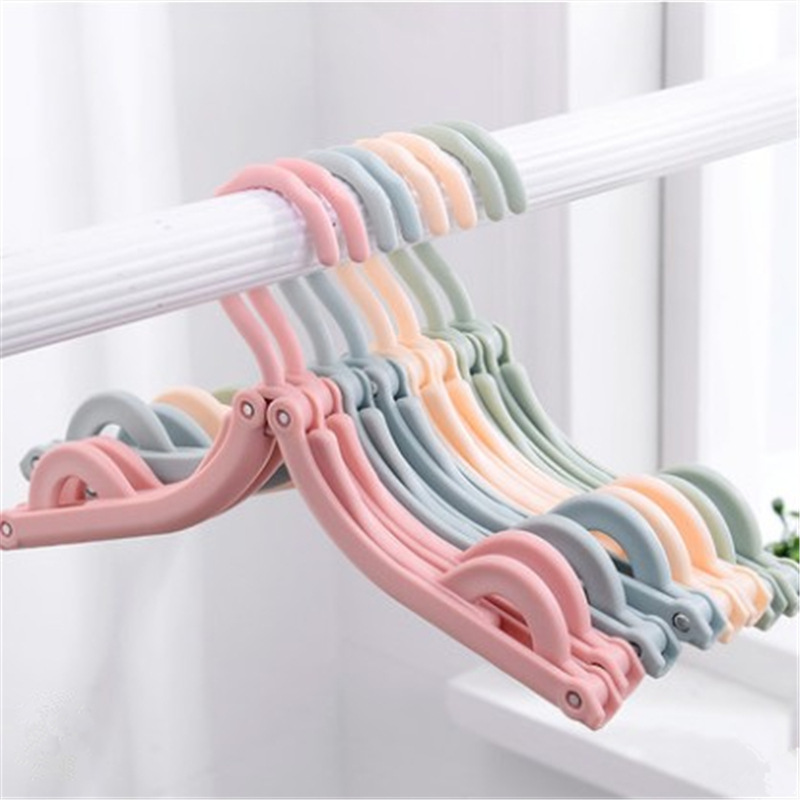 Wholesale of multi-functional magic travel folding clothes drying rack, portable children's storage plastic clothes rack, support and hanging rack Item Picture