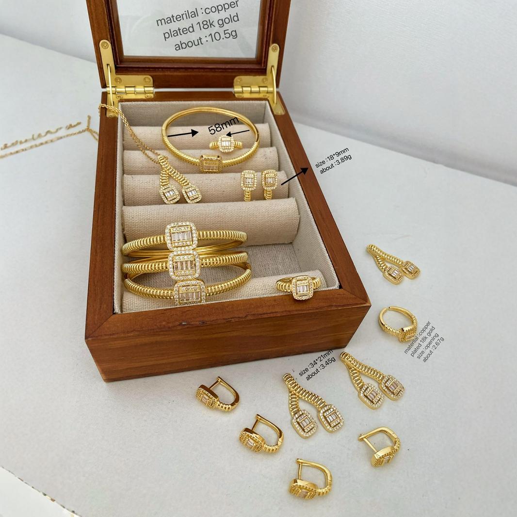 Cross-border creative European and American fashion open bracelet, ring, earrings, necklace set, 18K gold electroplated, fashionable and versatile style