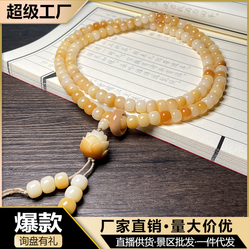 Wholesale of Bodhi Root Dunhuang color charcoal-baked old sandalwood Buddha hand pendants, lotus pendants, cultural play Buddhist beads, men's and women's necklaces