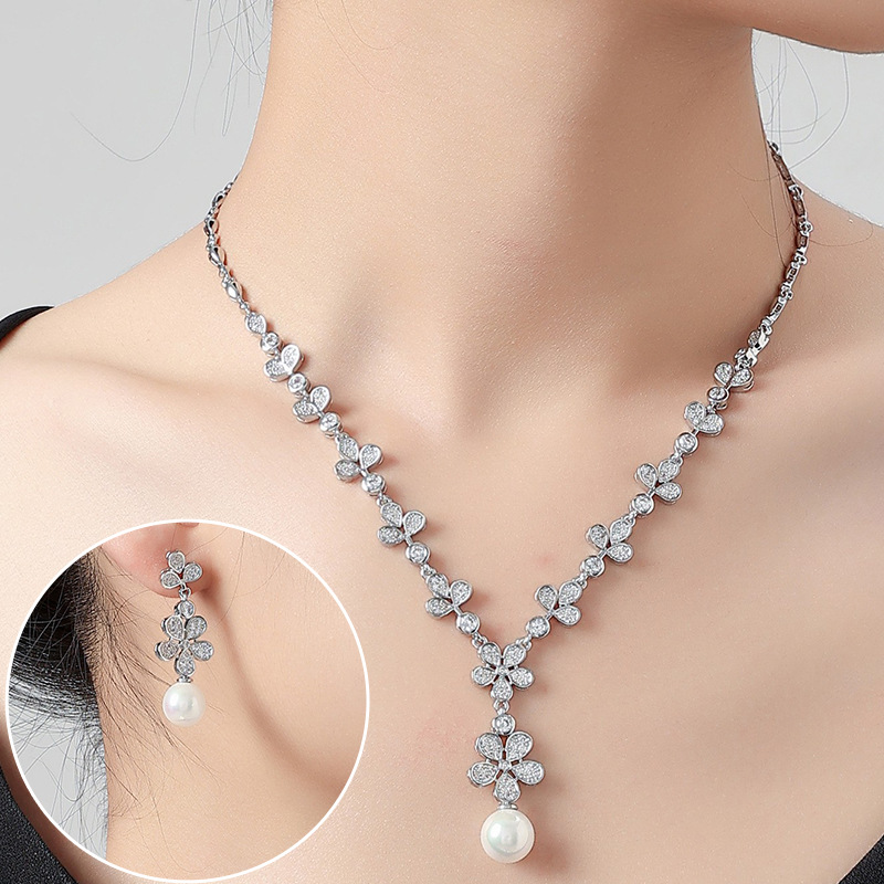 Cross-border bestsellers from Japan and South Korea: golden artificial pendant, pearl zircon earrings, two-piece set, bridal dress, evening gown and necklace details Picture