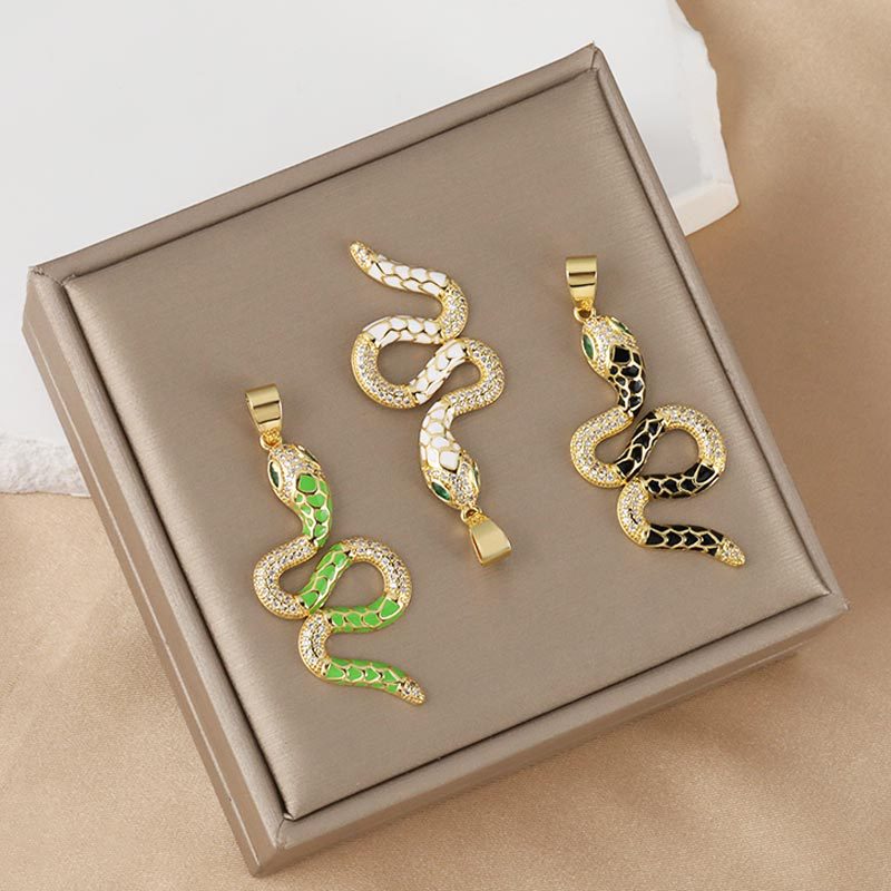 Wholesale and direct sales of new and popular micro-inlaid zircon oil-drip zodiac snake-shaped pendant accessories with cross-border personalized electroplated design Application Scenario