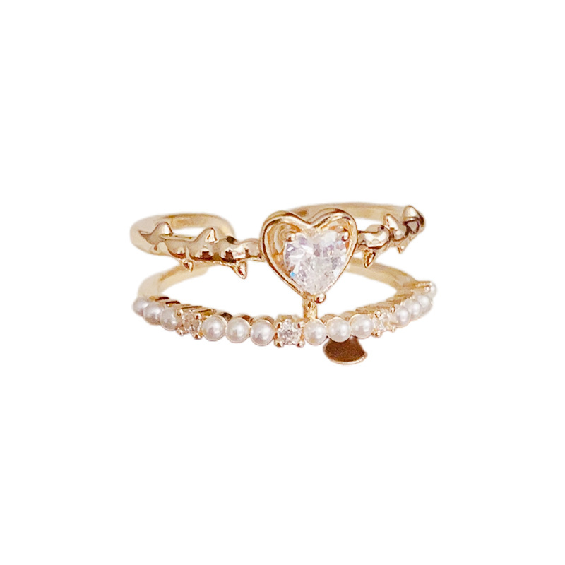 A light luxury and fashionable InS-style open-top ring for women, with a unique and simple design. It is a double-layered index finger ring made of zircon heart and pearl Application Scenario