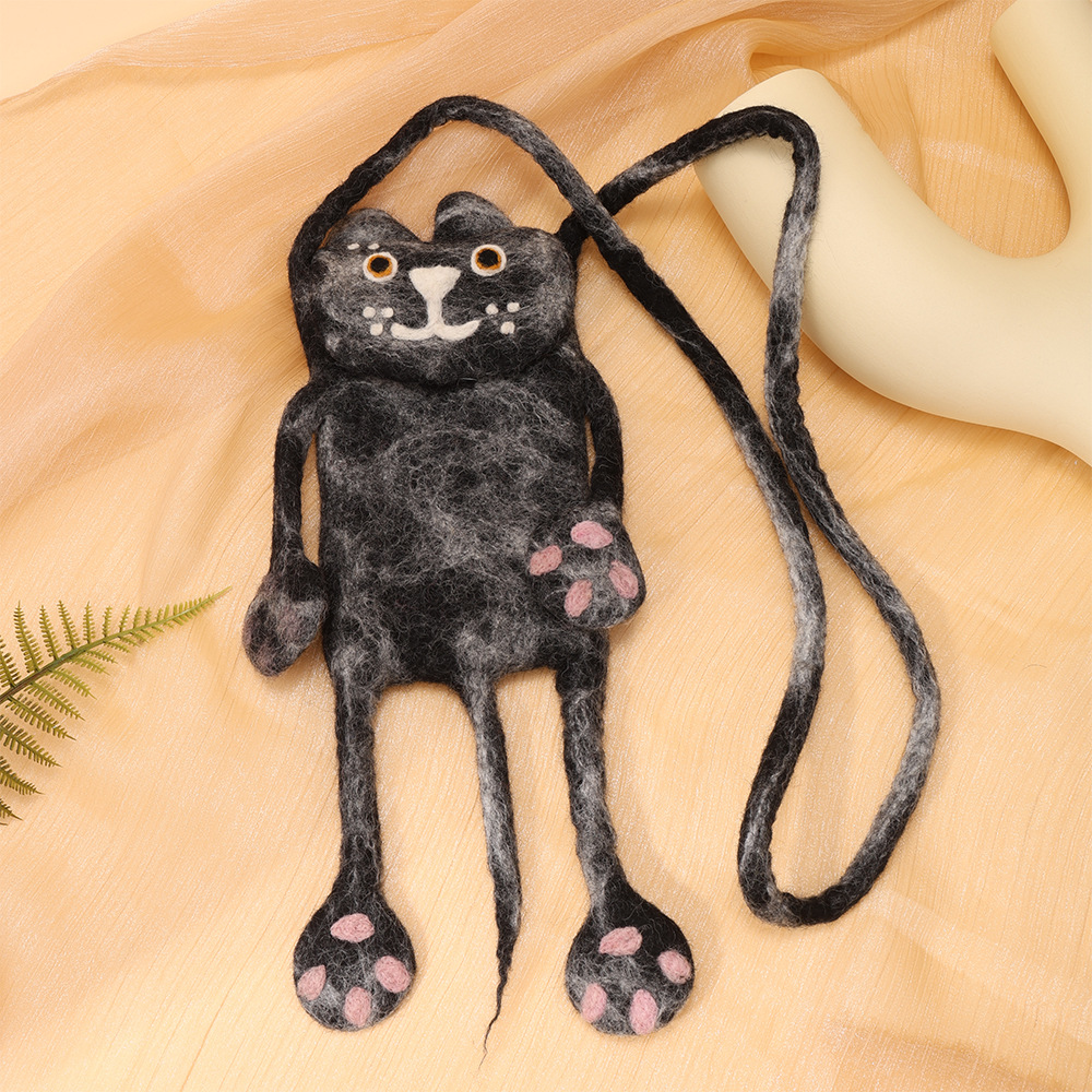 手工羊毛毡小黑猫卡通怪兽创意斜跨手机包时尚百搭小众可爱背包