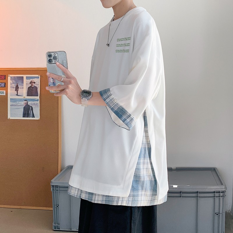 This is a new summer fashion Hong Kong brand ice silk T-shirt with a checkered patchwork design and a unique three-quarter sleeve style