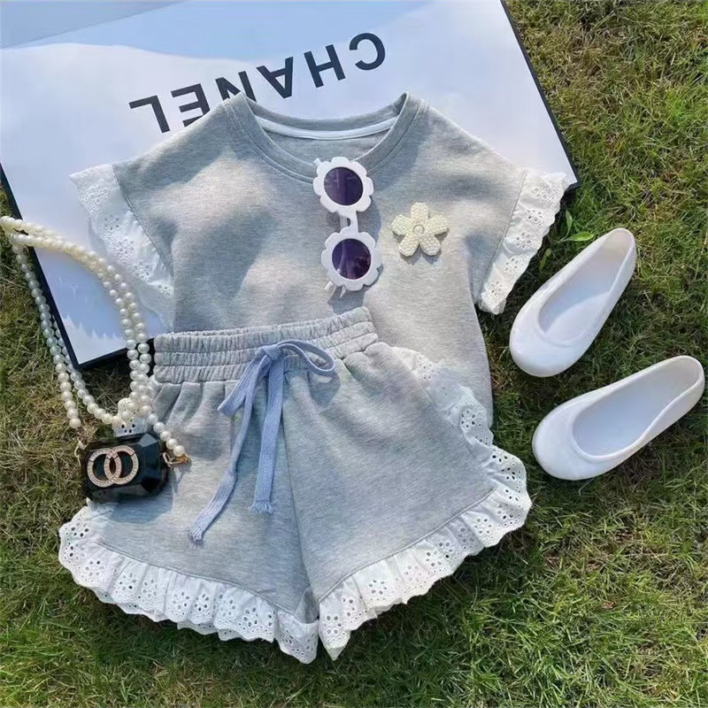 Chica vestido de verano bebé versión coreana casual encaje encaje manga corta camiseta pantalones cortos cortos dos piezas zoe