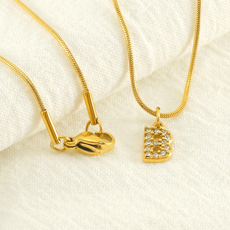 Cross-border European and American stainless steel fashion 26 English diamond-encrusted small letter necklace, simple and versatile titanium steel snake chain necklace for women Specification image