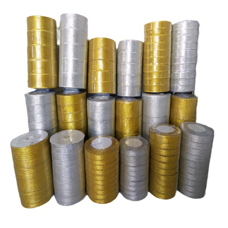 Scallions with gold and silver ribbons, gold scallions with silver scallions, fruits, flowers, cakes, baking, gifts, packaging ribbons details Picture
