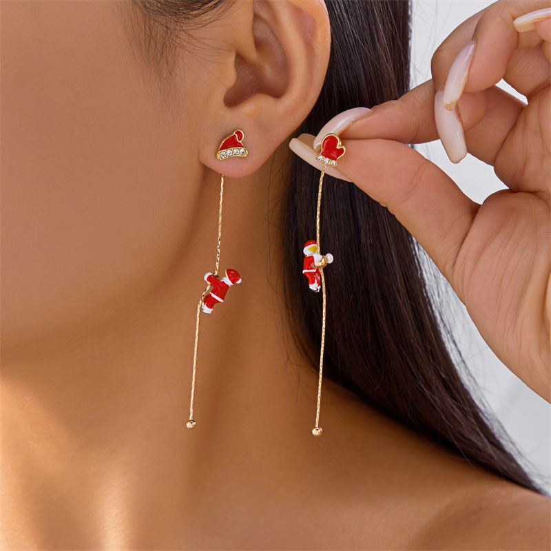 New cross-border Christmas earrings from Europe and America, creative and versatile. Santa Claus climbing asymmetrical earrings for women wholesale Application Scenario