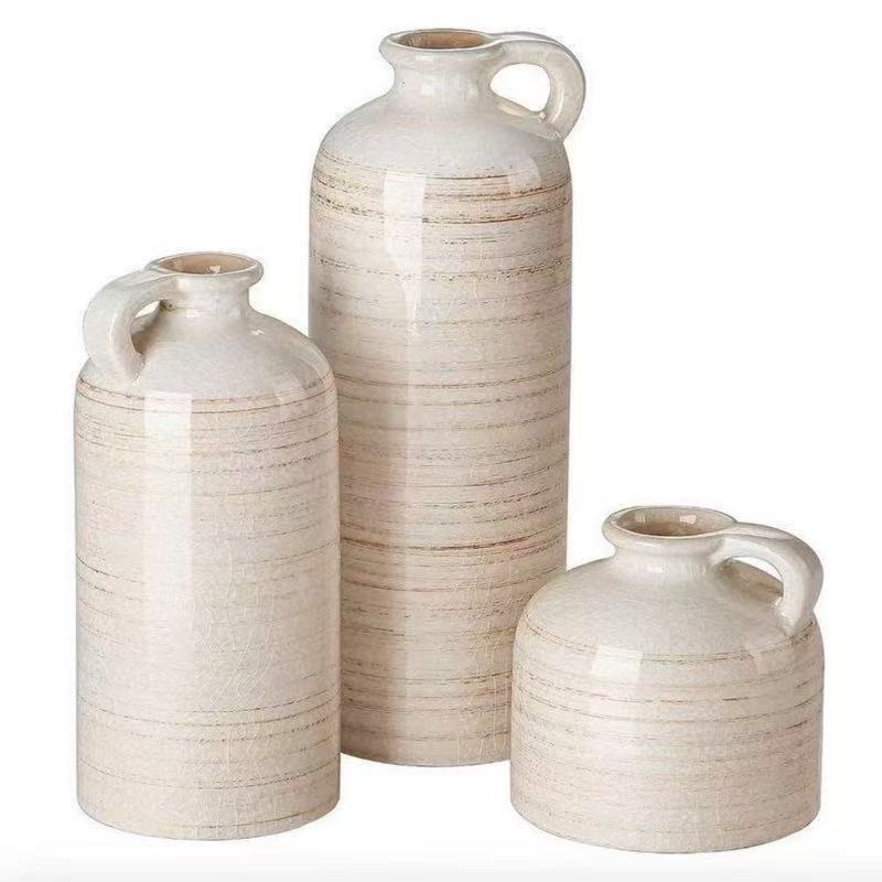 Amazon comercio exterior grietas vidriadas jarrón de cerámica antigua florero vintage blanco casa sala de estar decoraciones de flores secas piezas de arte floral simples botella de cerámica blanca con flores secas Item Picture
