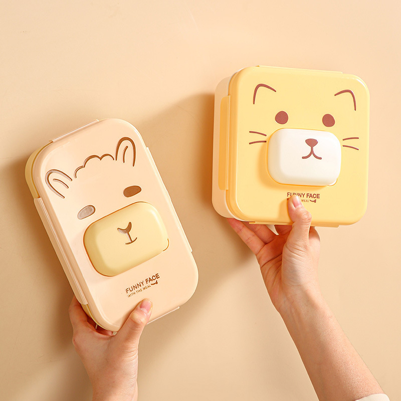 Cute compartments student lunch box that can be heated in a microwave oven. Home cartoon bento box. Office worker lunch box with tableware Application Scenario