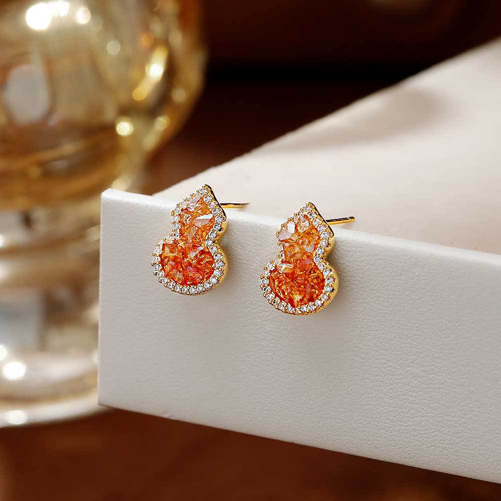Hyacinth luz de lujo color creciente cristal calabaza pendientes para mujeres luz de lujo nicho alto sentido de temperamento pendientes únicos hermosos orejas