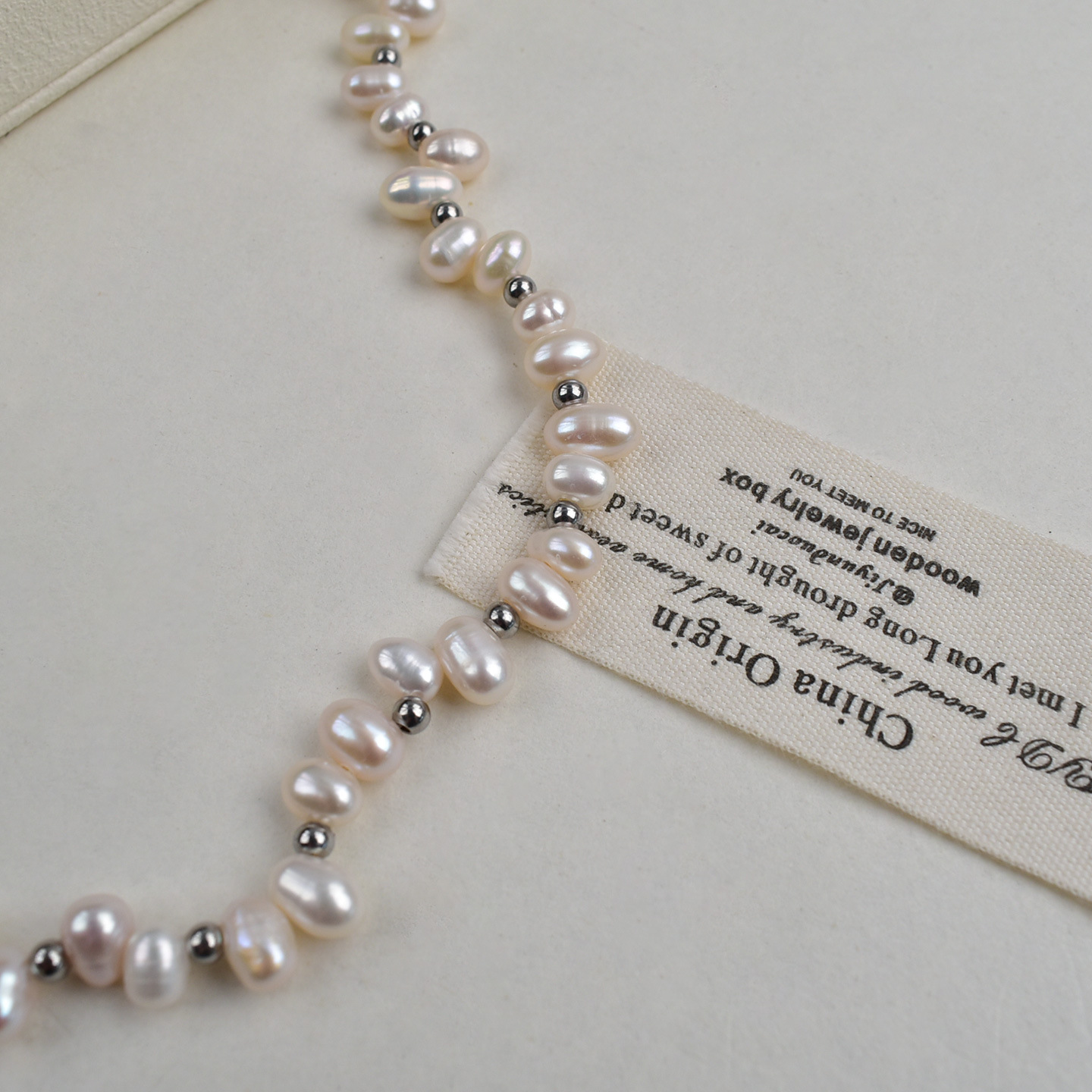 Sanqi hole rice pearl natural freshwater pearl necklace, women's versatile sweater chain, high-end beaded necklace accessory Application Scenario