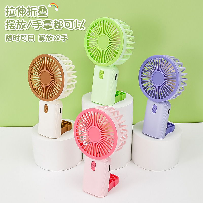 Simple and portable light sound handheld mini fan, fresh desktop fan, USB charging small fan Application Scenario