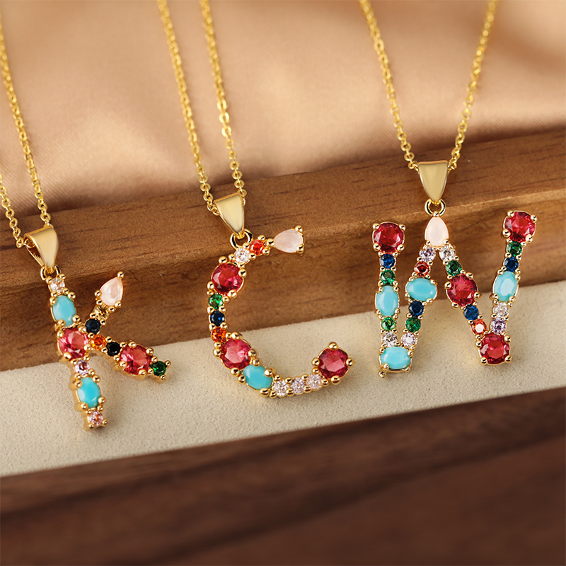 A cross-border copper micro-inlaid colored zircon pendant with 26 English letters, a niche hip-hop necklace and collarbone chain