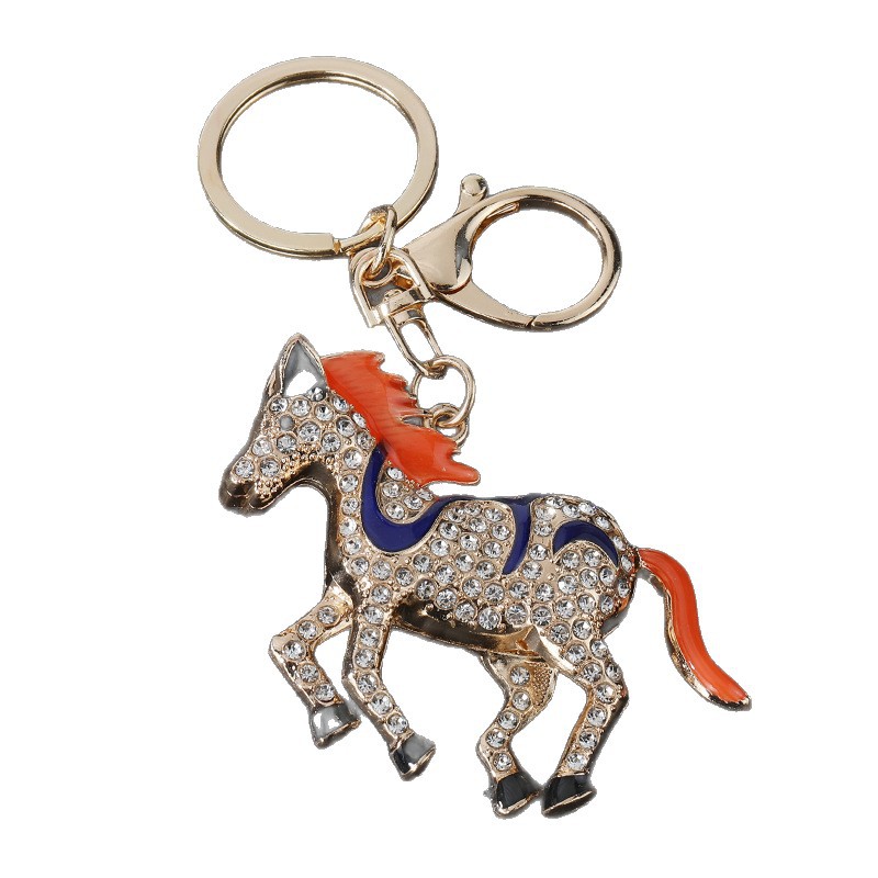 钥匙扣/钥匙扣公仔挂件/流沙入油玩具/挂饰/琥珀钥匙扣白底实物图