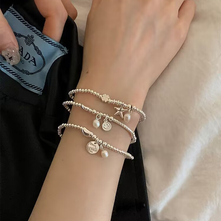 S925 sterling silver simple and elegant starfish smiling face pendant beaded bracelet, light luxury, niche and exquisite, a perfect accessory for your best friend Specification image