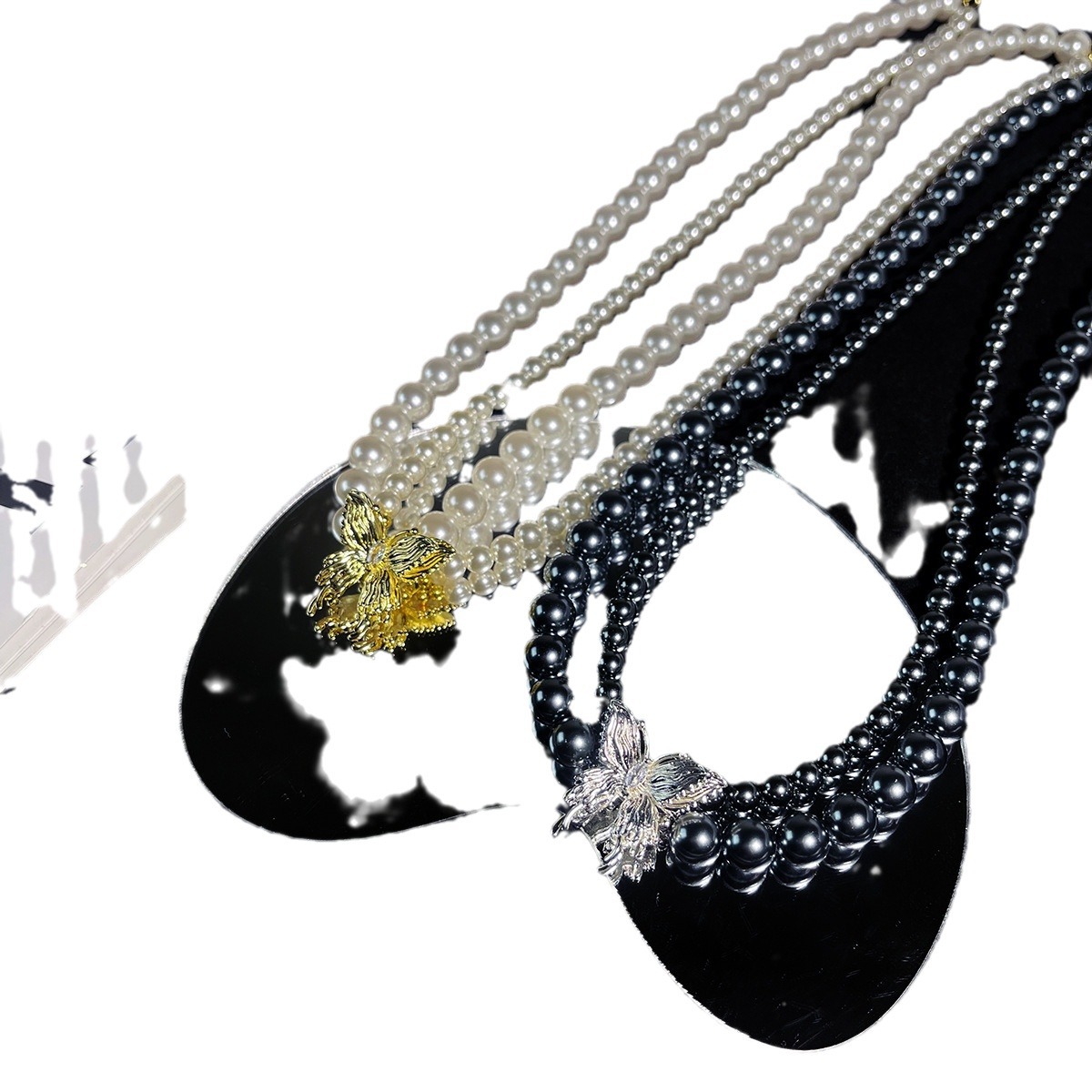 The 2024 new double-row butterfly pearl necklace exudes a high-end feel. The Australian white and Tahitian black pearl necklace and collarbone chain are exquisite Item Picture