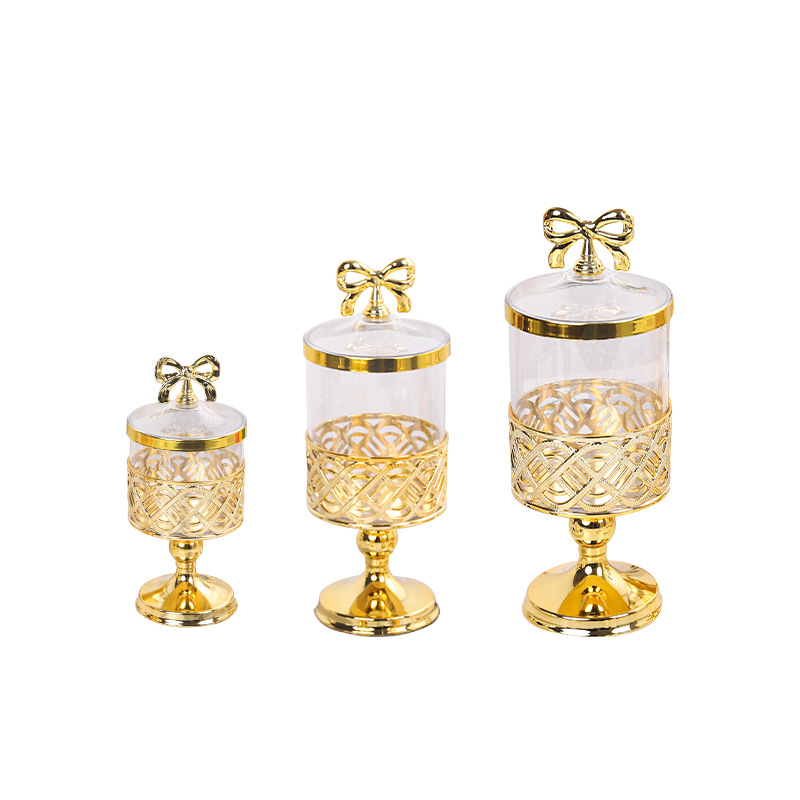 外贸欧式PET带盖糖果罐金色镂空居家客厅摆件收纳储蓄糖果坚果罐白底实物图