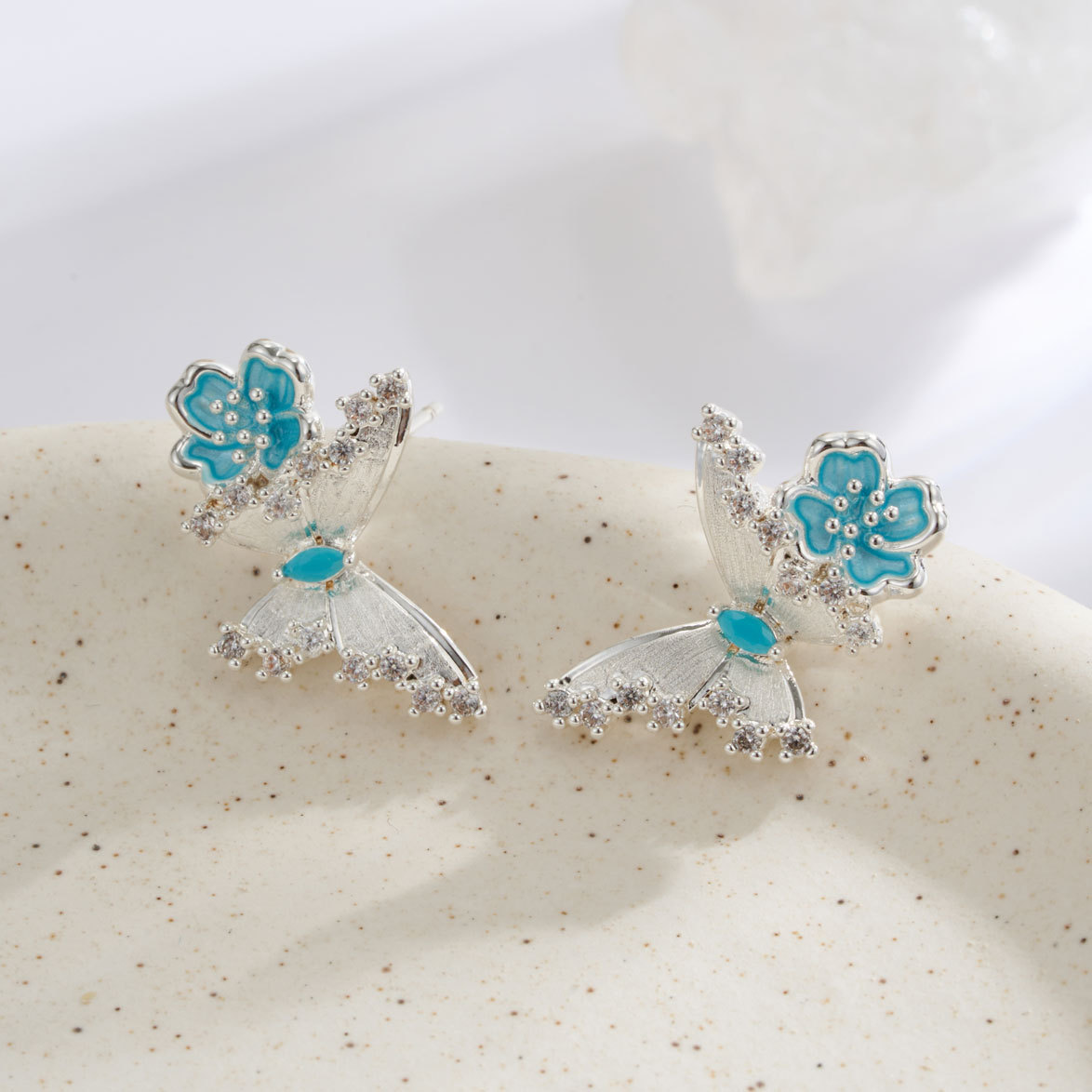 Spring and summer new ice blue enamel crabapple flower butterfly stud earrings, copper alloy brushed zirconium-inlaid s925 silver needle light luxury earrings Application Scenario