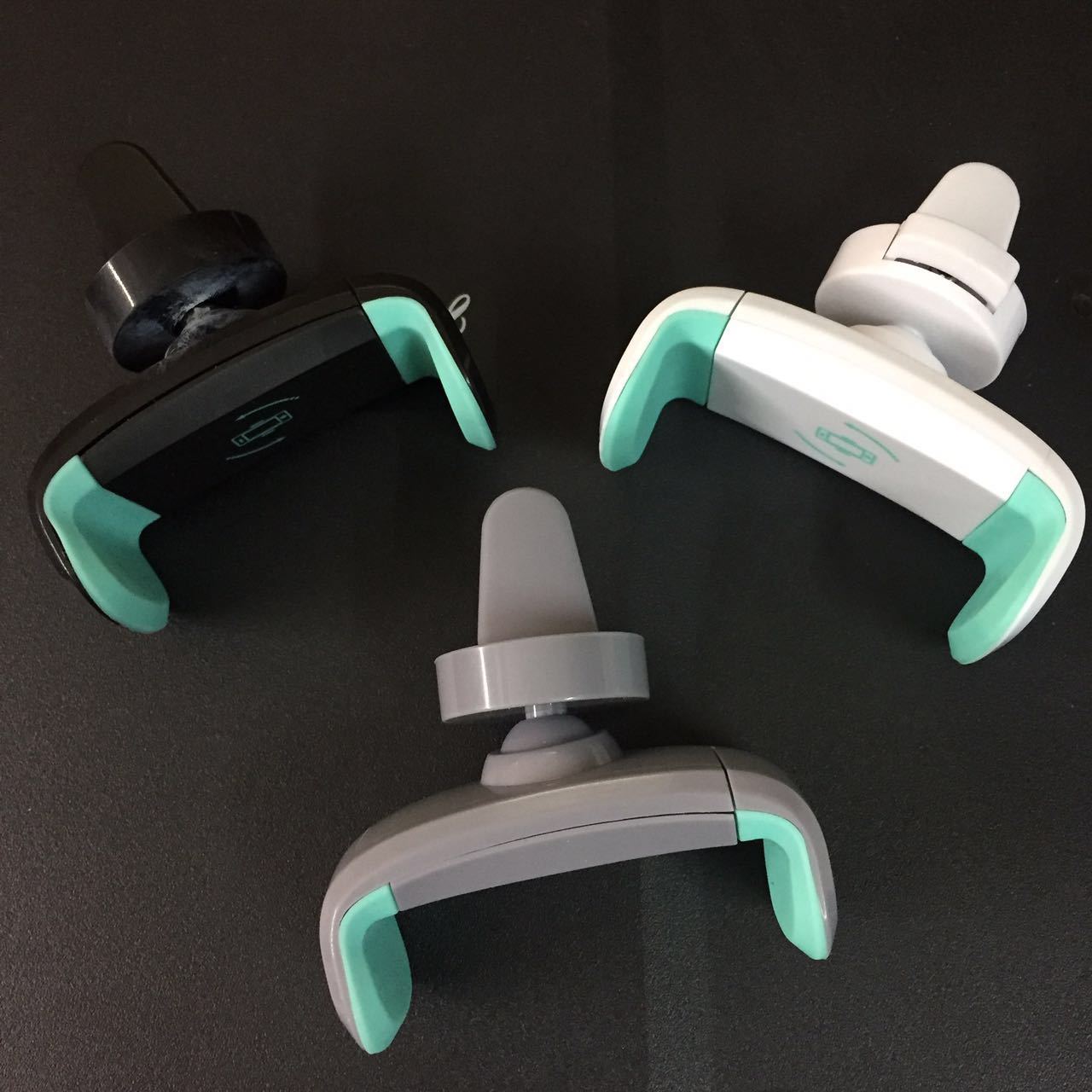 LOGO air outlet, air conditioner, car phone stand, 360-degree rotating phone base, car navigation system, cross-border details Picture