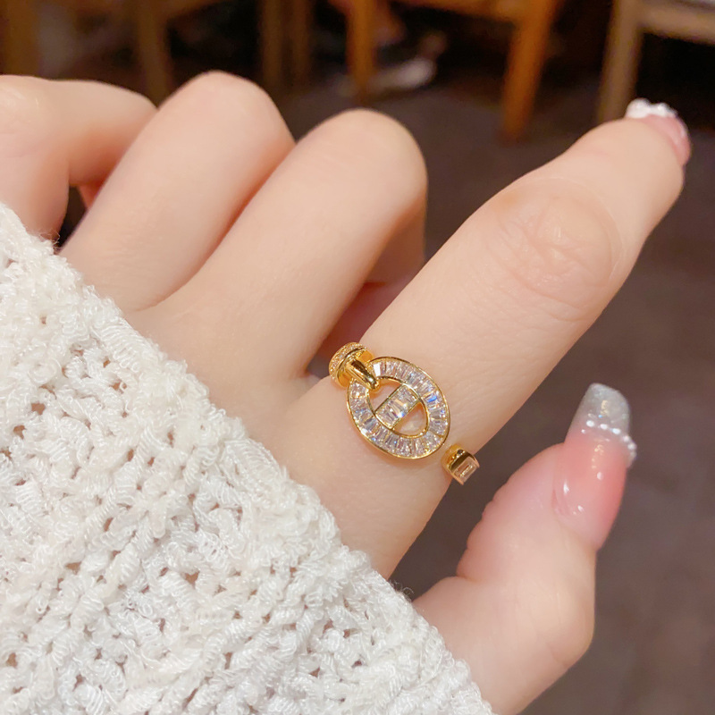 This light luxury and fashionable zircon open ring with a pig nose is a trendy and niche index finger ring for women. It is versatile and adjustable