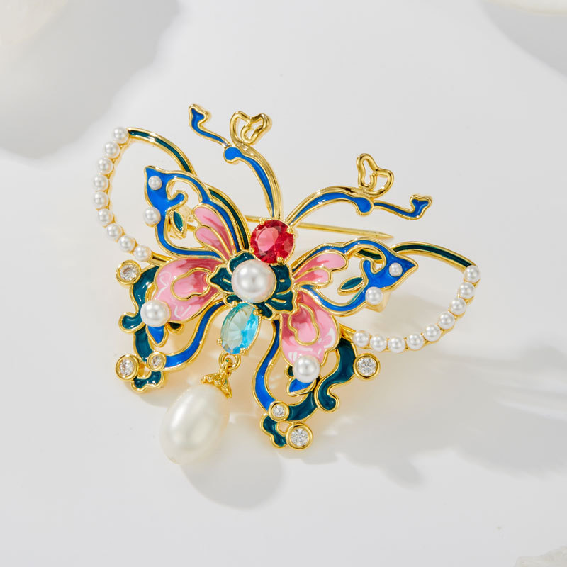Exquisite national trend enamel butterfly pearl brooch with a fashionable and high-end feel, copper alloy inlaid zircon dress brooch Application Scenario