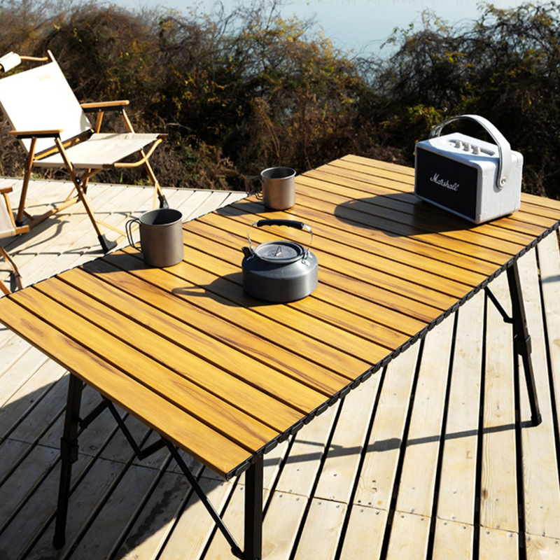 Outdoor camping table, camping folding aluminum alloy egg roll table, portable picnic adjustable table and chair set Application Scenario