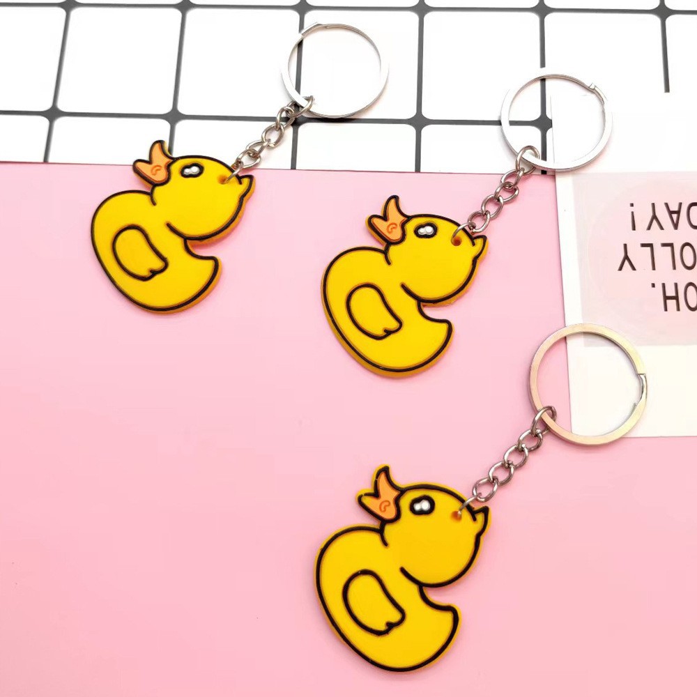 Wholesale cartoon PVC soft rubber little yellow duck keychains, personalized pendants, small gifts and cute accessories