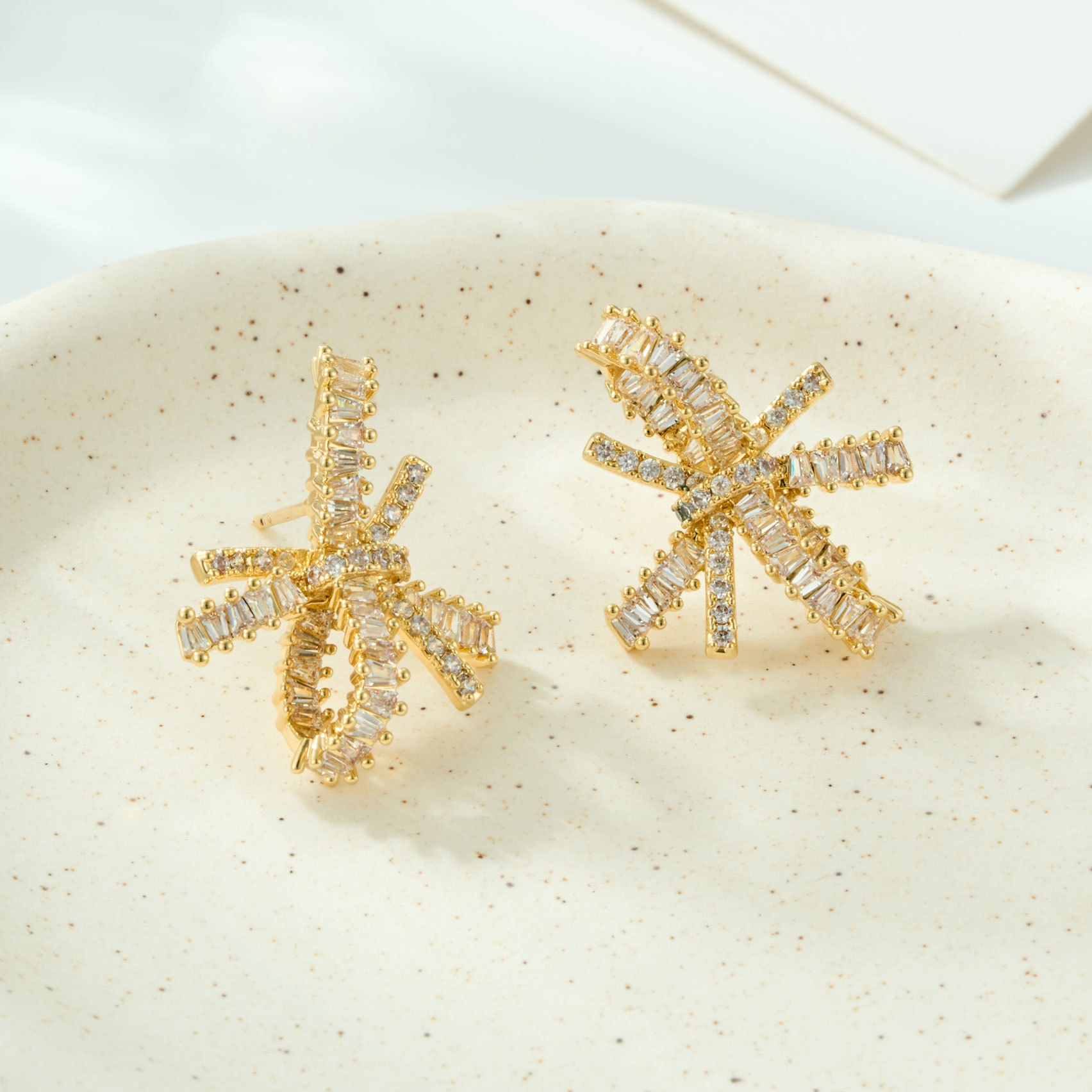 Light luxury and high-end bow stud earrings, copper alloy, real gold electroplated, square zirconium s925 silver needle, versatile commuting earrings Application Scenario