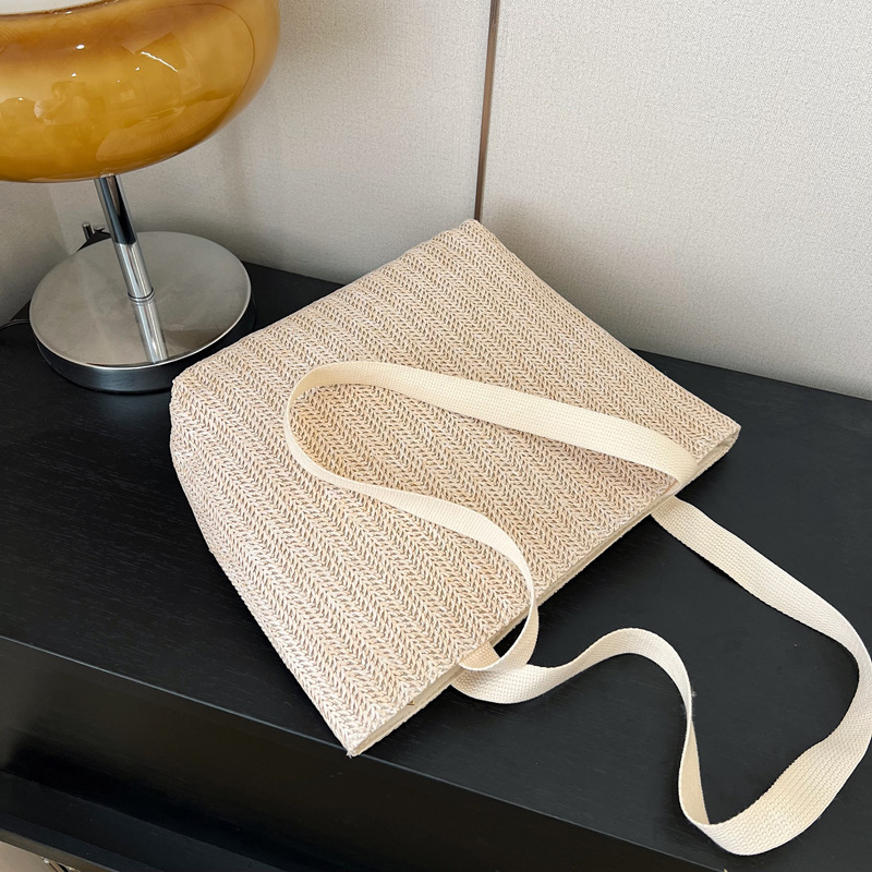 Bolsa de paja transfronteriza de color sólido simple de gran capacidad bolsa de mujer de paja de un hombro ligero para el trabajo diario bolsa de tejido de vacaciones junto al mar bolsa de playa bolsa de paja artesanal Specification image
