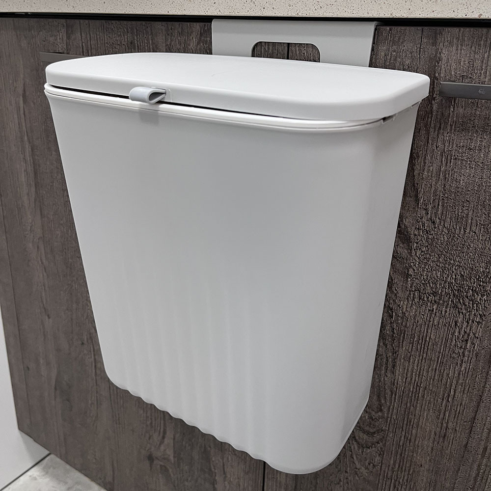 Kitchen trash can, wall-mounted household cabinet door, wall-mounted kitchen waste bin, suspended bathroom toilet details Picture
