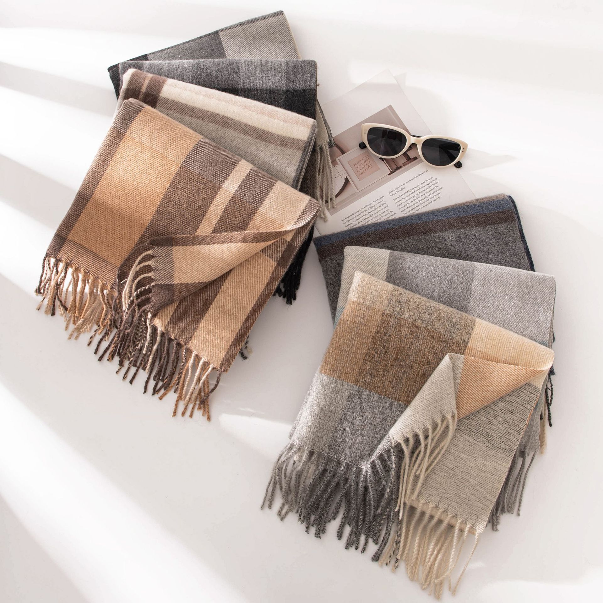 The women's winter scarf exudes a sense of sophistication. The autumn grey checkered faux cashmere scarf has a fashionable and warm design. The scarf is a shawl for men Application Scenario