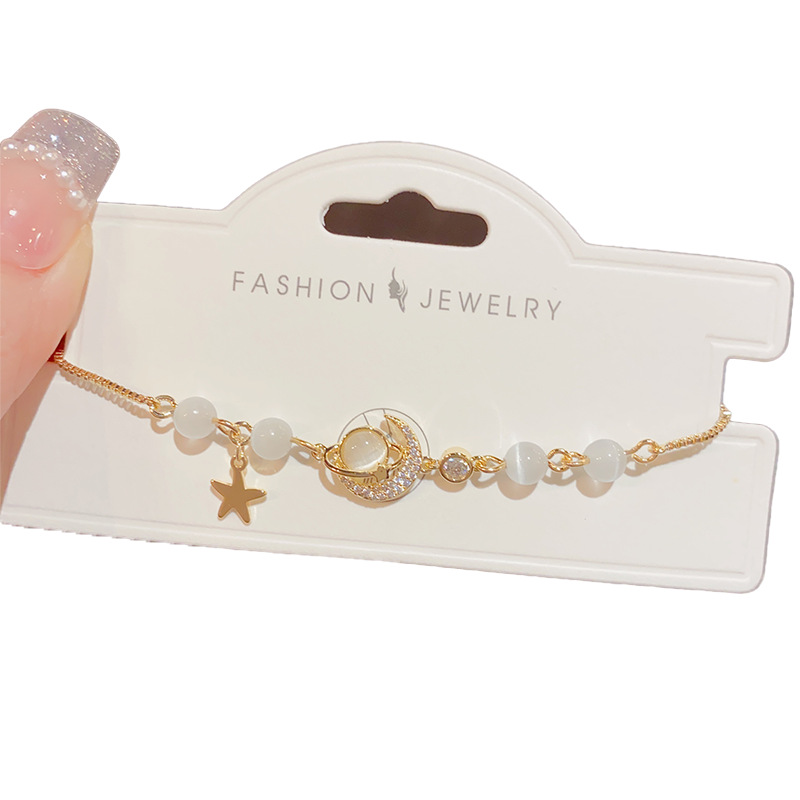 A new sweet and cool summer style planet Moon cat's eye stone pull-out bracelet for women, presenting a fashionable and high-end look Item Picture