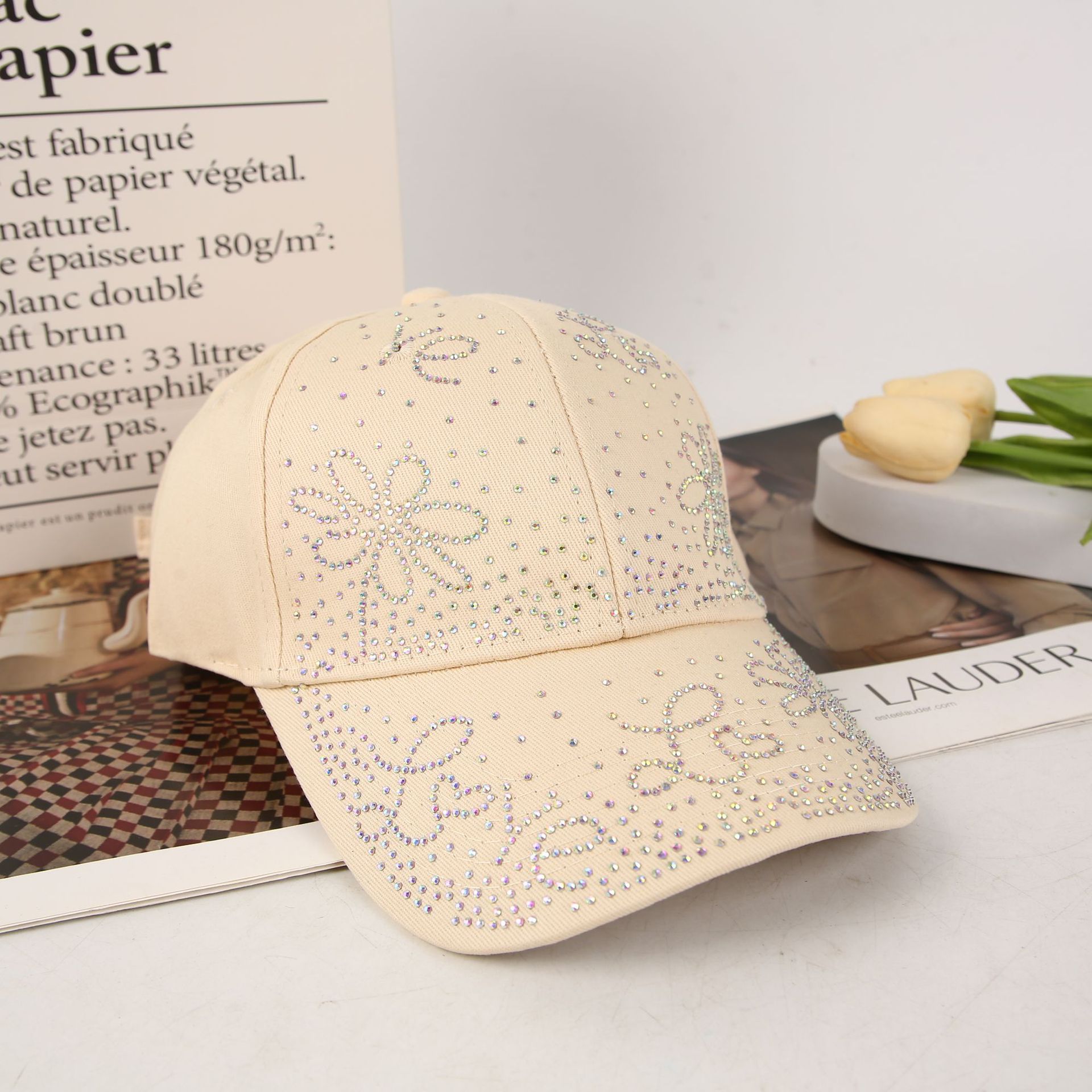 A new fashionable baseball cap with a light luxury water diamond butterfly for women. It is a versatile, casual and stylish shade baseball cap for women